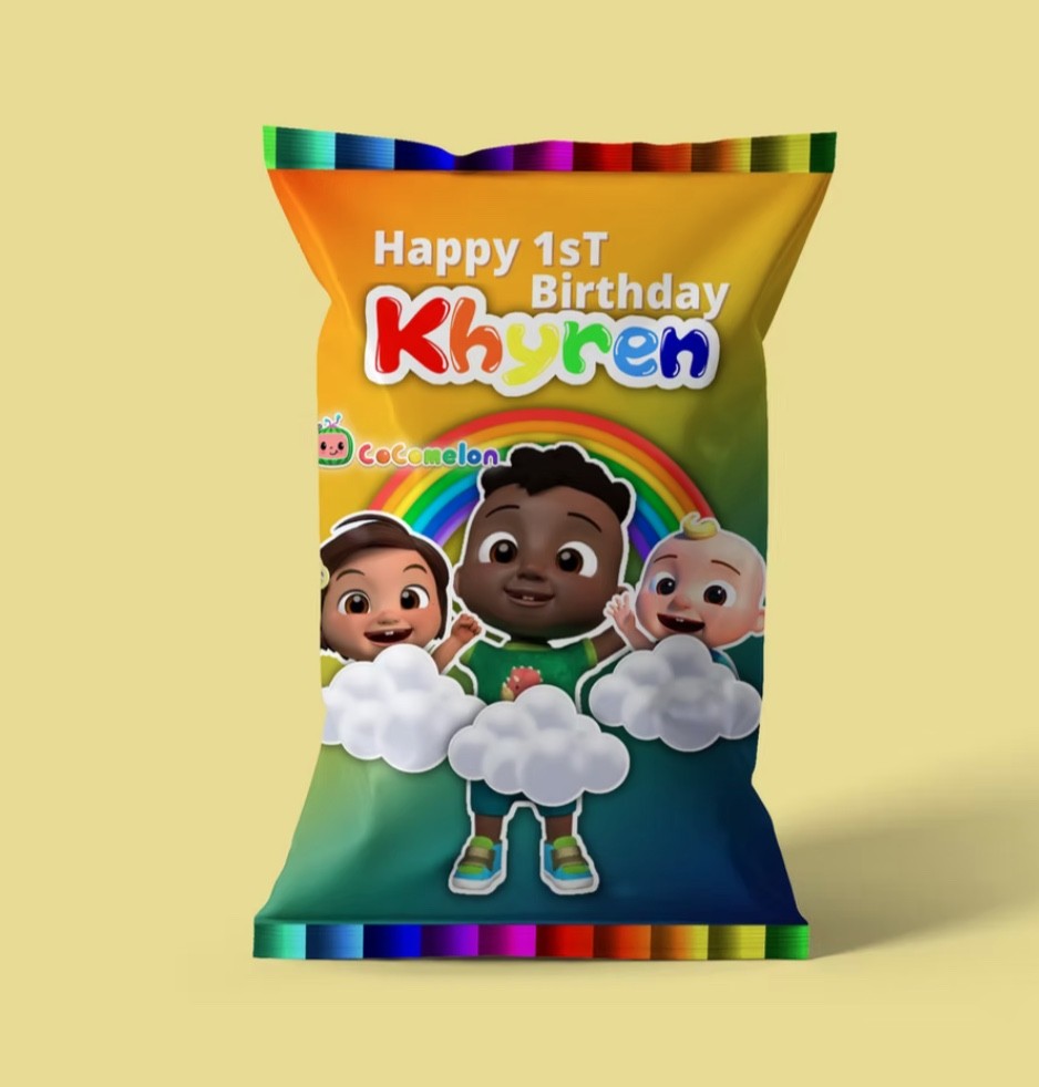 Bright yellow, green and rainbow birthday treat-bag artwork with personalized first-birthday lettering and animated characters